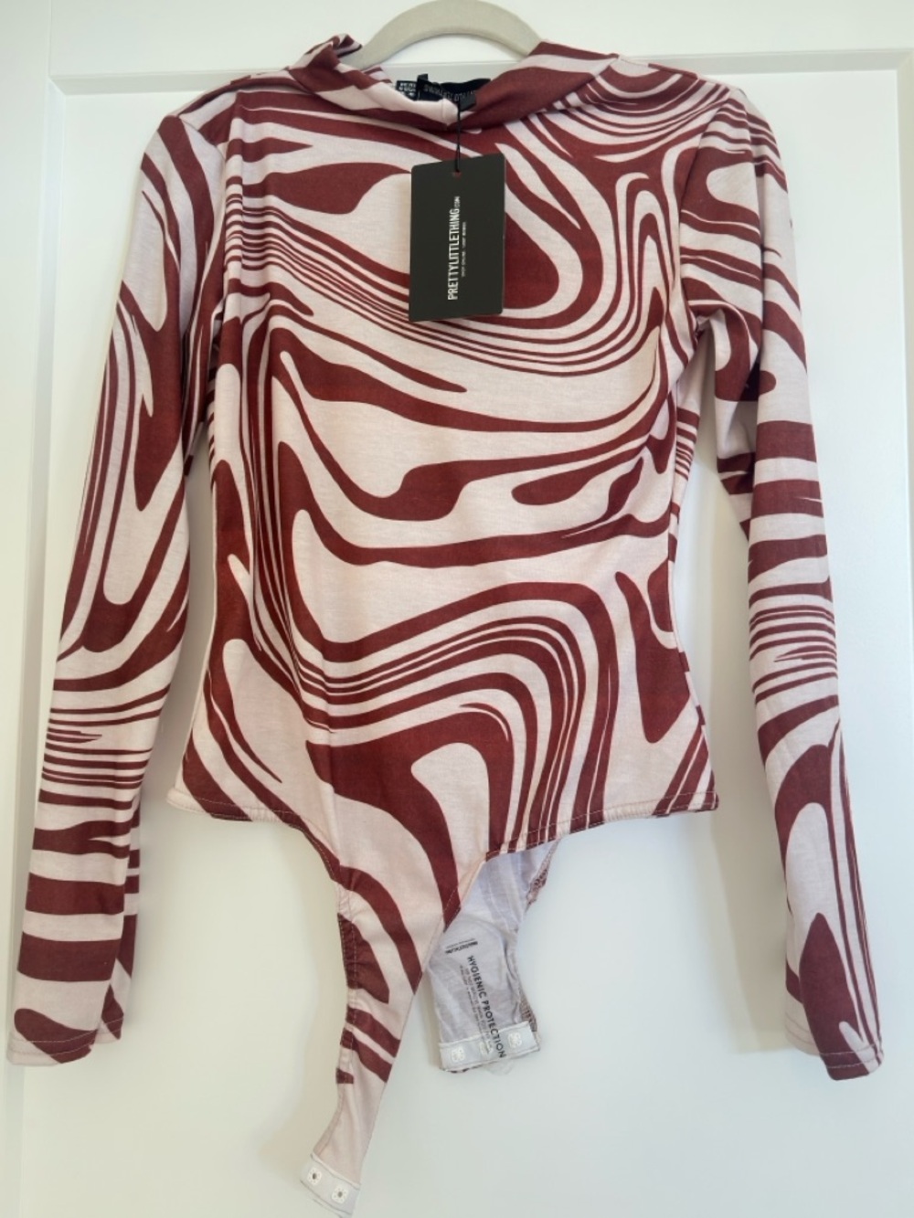 PrettyLittleThing Asymmetrical Black and White Long Sleeve Bodysuit